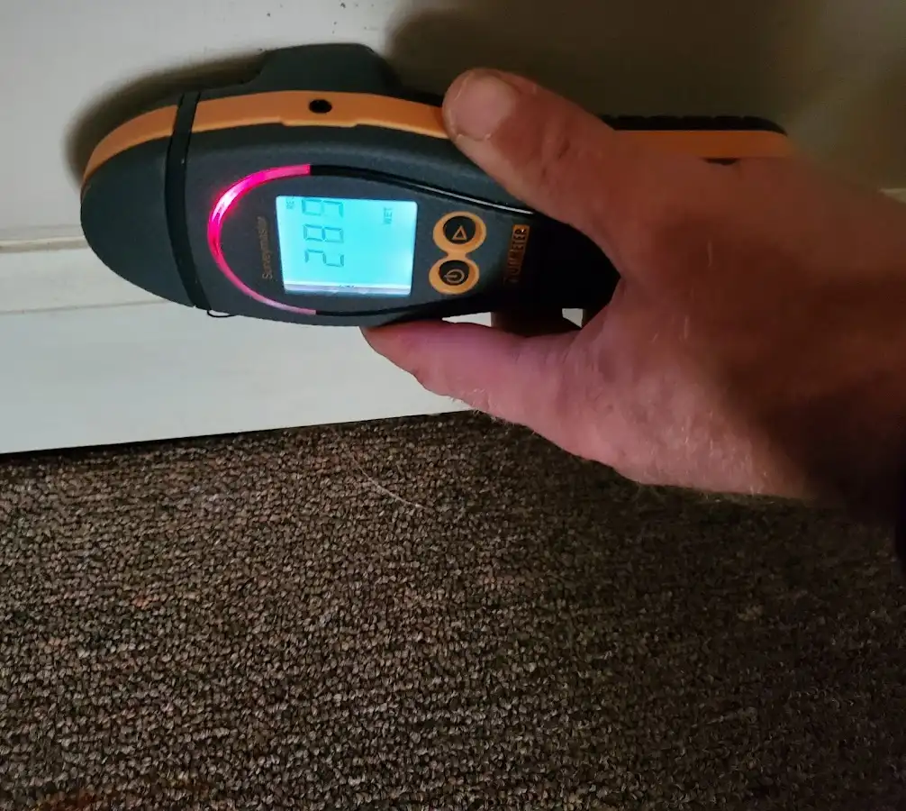 Moisture detection at baseboard during Sewage Cleanup & Sanitation in Gonzales